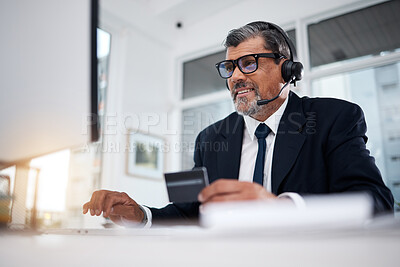 Buy stock photo Call center, business man and credit card at computer for financial telemarketing, ecommerce and discount in office. Happy consultant, mature salesman and trading with online banking at desktop pc 