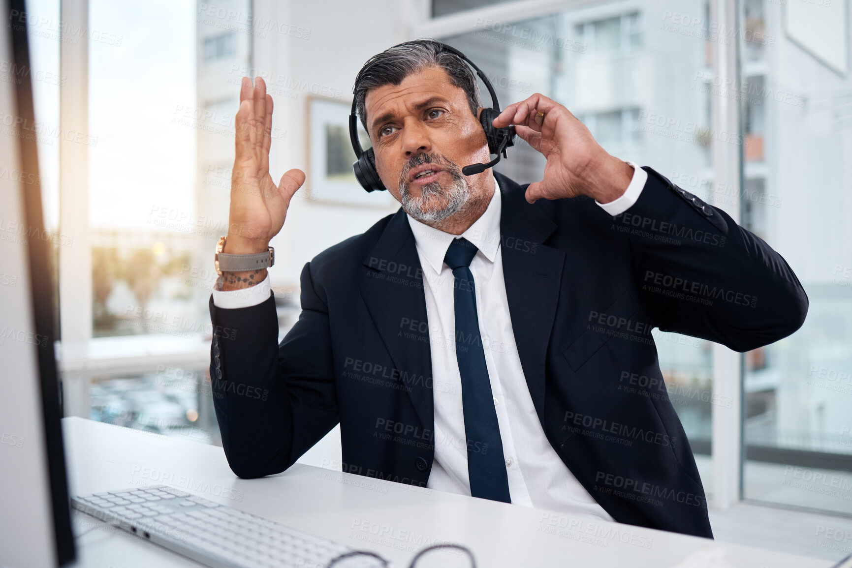 Buy stock photo Talking, call center and mature man in customer service for communication or support. Conversation, contact and sales manager, telemarketing professional and crm consultant in discussion at help desk