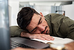 Sleeping, businessman and desk in office, workplace and consultant with fatigue, tired energy and corporate burnout. Exhausted, employee and person sleep at work from stress, anxiety or overtime