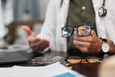 Buy stock photo Glasses, choice and doctor hand in optometrist office with lens shopping and wellness option. Frame, vision and optician decision in clinic for eye support, health and medical exam with professional