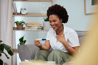 Buy stock photo Happy woman, pregnancy test and positive in relax or joy on sofa for results in living room at home. Excited African female person with maternity exam or good news on lounge couch in the house