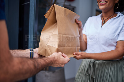 Buy stock photo Delivery, customer and hands with a paper bag at door from courier man at home. Giving woman or a client a package, parcel or fast food from online shopping, e-commerce or distribution service