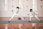 Fight, training and people in fencing competition, duel or combat with martial arts fighter and athlete with a sword and weapon. Warrior, blade and couple in creative fight, exercise or fitness