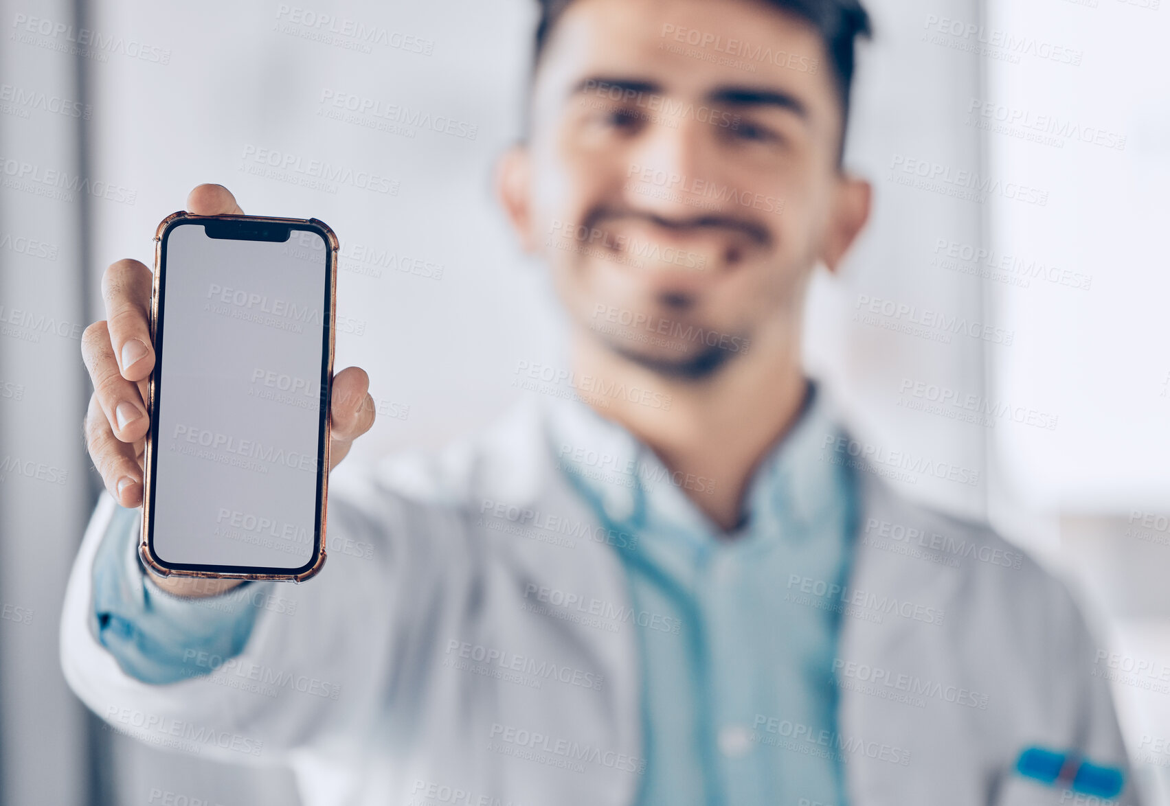 Buy stock photo Happy man, doctor and phone mockup screen for healthcare advertising or marketing at the hospital. Male person or medical professional show mobile smartphone display for Telehealth or app at clinic