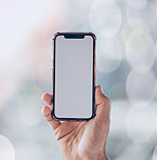 Person, hands and phone mockup screen for advertising, social media app or networking against a bokeh background. Closeup of mobile smartphone display for advertisement, logo branding or marketing