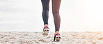 Fitness, legs and feet running on beach sand for exercise, sports athlete or energy with mockup space from the back. Banner, closeup or shoes of runner at ocean for cardio workout, training or action
