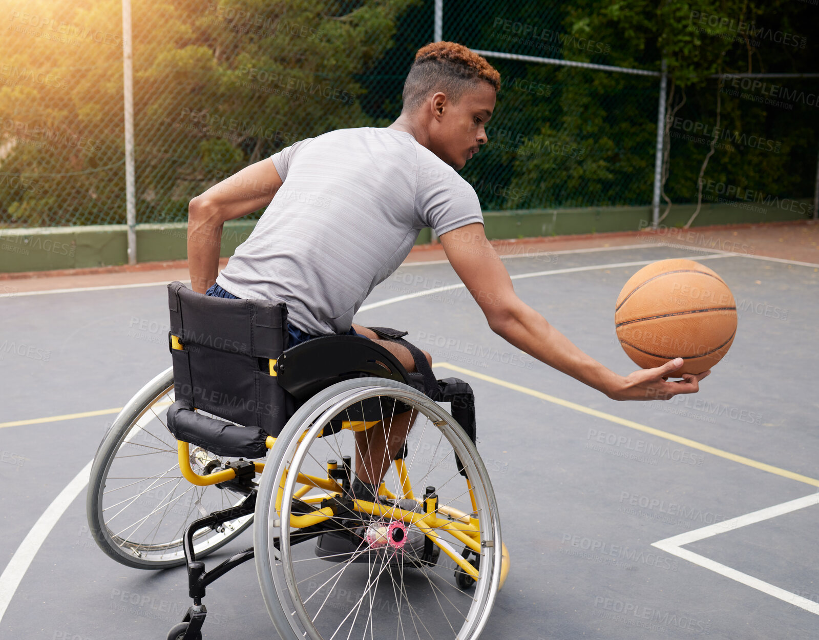 Buy stock photo Sports, basketball court and man in wheelchair for playing competition, challenge and practice outdoors. Fitness, wellness and male person with disability with ball for training, workout and exercise