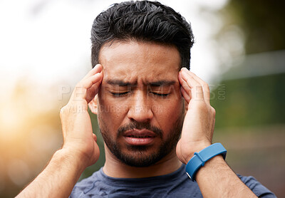 Buy stock photo Face of sports man, headache and pain outdoor for injury, vertigo and tired of exercise problem. Sad asian athlete, sick runner and training with migraine, fatigue or stress of burnout for fitness