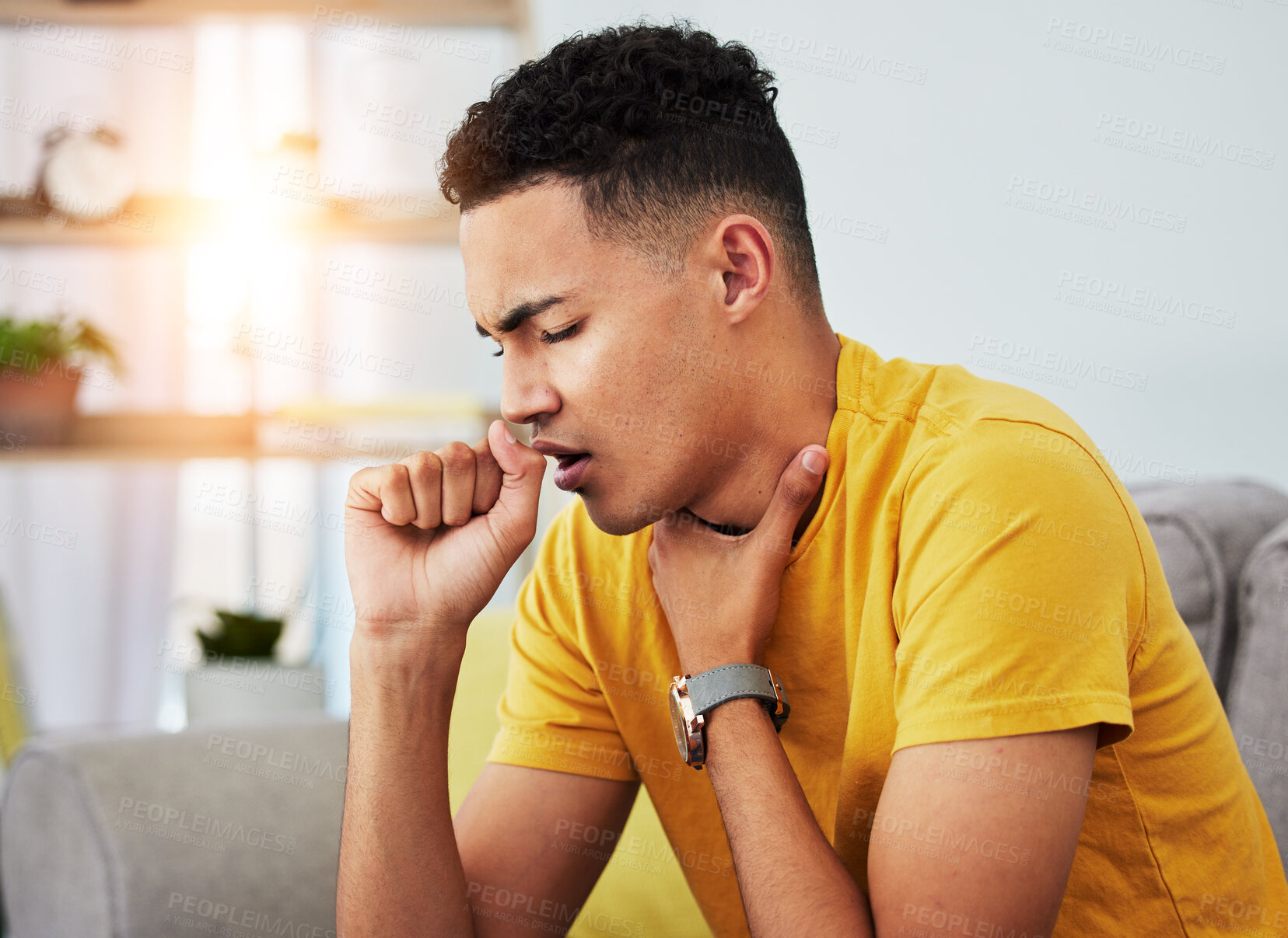 Buy stock photo Man on couch, cough and sore throat with flu, sick and home with inflammation, health issue and cold. Male person, house and guy with recovery from covid, healthcare and illness with chest infection