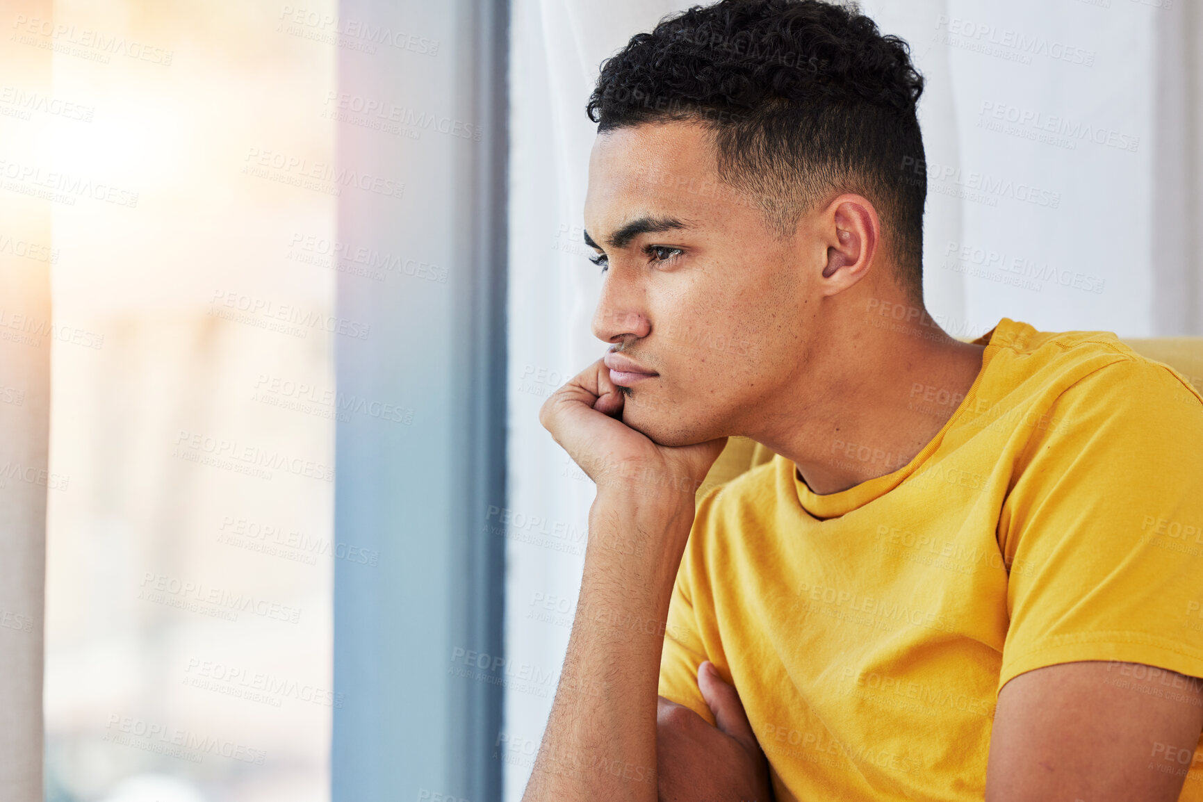 Buy stock photo Thinking, man and home with stress and sad in living room feeling bored and frustrated. Moody, grief and mental health of a male person on a couch with anxiety and tired from concerns of fail