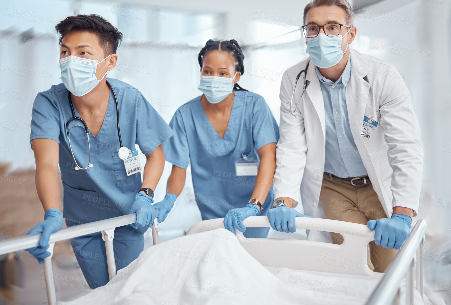 Buy stock photo Rush, bed and doctors in hospital for emergency operation in ER with a sick patient or face mask. Surgery team, pushing or surgeons in the theater for surgical medicine procedure or risk treatment 