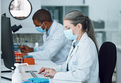 Buy stock photo Woman, computer and face mask in science laboratory for medical virus research, medicine or vaccine development. Mature scientist, man or technology keyboard for healthcare or genetic disease control