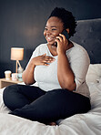 Phone call, smile and black woman in home bedroom, talking and communication. Smartphone, conversation and African plus size person happy for discussion, chat and speaking to contact in bed in house