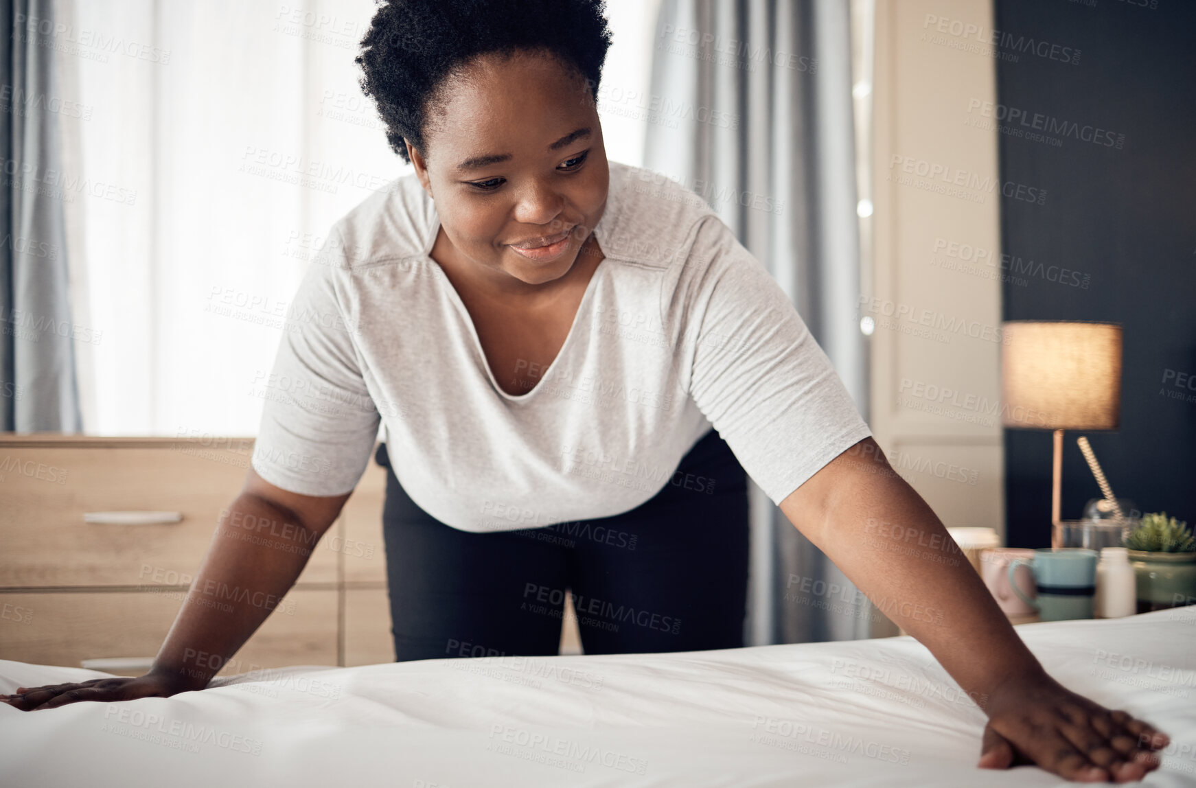 Buy stock photo Black woman, bed and cleaning bedroom, hygiene and housekeeping with morning routine at home. African female person, cleaner service and change sheets with maintenance, housekeeper and hospitality