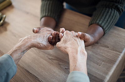 Buy stock photo Holding hands, support and praying, people and counseling top view with psychology and therapy together. Kindness, respect and worship, trust and help, wellness with communication, comfort and care