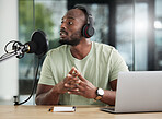 Black man, microphone and laptop, headphones and radio DJ with news, communication and audio equipment. Podcast, technology and multimedia with male person, talking with announcement and broadcast