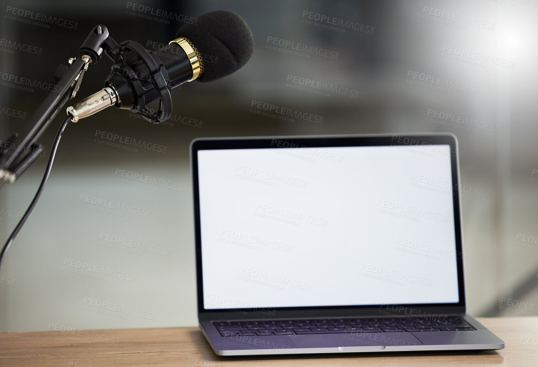 Buy stock photo Microphone, laptop mockup and screen with audio, radio or podcast equipment with technology and show marketing. Multimedia, communication and email with website design layout, news and about us on pc