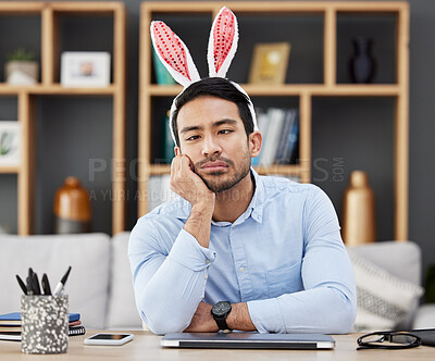 Buy stock photo Tired, bunny ears and business man for Easter in office with decoration for celebration, event and party. Burnout, stress and Asian male person with fatigue at desk with rabbit headband for holiday