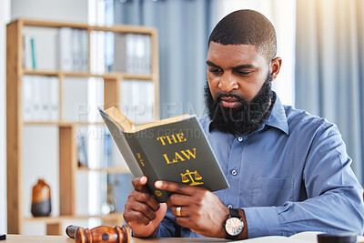 Buy stock photo Man, reading and lawyer with a book on the law, rules or research on legal constitution, regulation or policy from government. African businessman, judge or attorney with knowledge of justice