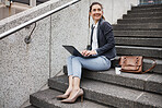 Business woman, stairs and thinking with laptop, planning schedule and ideas, copywriting and typing in city. Young entrepreneur, smile and sitting on steps with computer for remote work in metro cbd