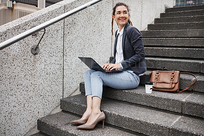 Buy stock photo Business woman, stairs and thinking with laptop, planning schedule and ideas, copywriting and typing in city. Young entrepreneur, smile and sitting on steps with computer for remote work in metro cbd