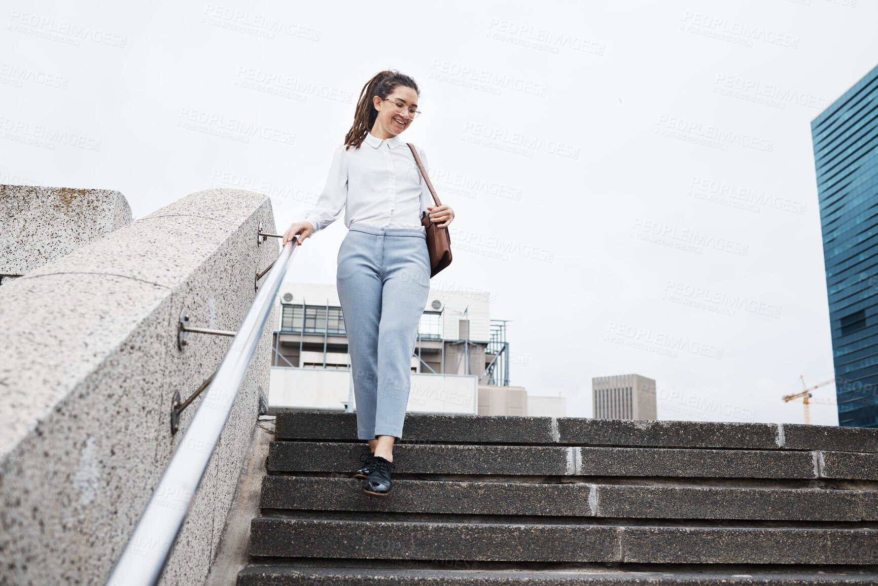 Buy stock photo Woman, worker and walking on city building steps happy, smile and cheerful while traveling. Travel, walk and female person smile for commute, leaving and enjoying solo trip in New York outdoor