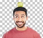 Happy, apple and balance on a head with a man in studio isolated on a white background for diet or nutrition. Smile, nutritionist and food with a healthy young male balancing fruit for detox or fiber