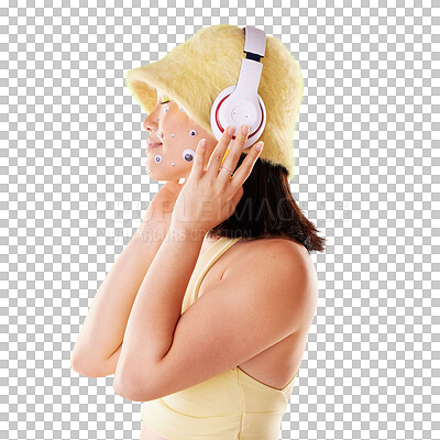 Makeup, music headphones and woman in studio isolated on a yellow background. Eye stickers, freedom technology and young female model listening, enjoying and streaming radio, podcast and audio song.