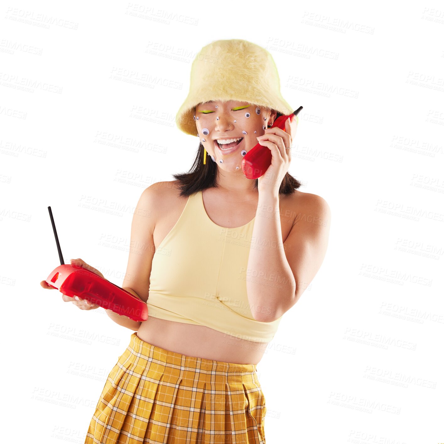 Buy stock photo Fashion, landline and funny woman on a call isolated on a transparent png background, art eyes stickers on her face and 90s aesthetic. Communication, telephone and happy Asian model with gen z laugh