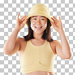 Fashion, asian and portrait of a woman with comic eyes isolated on a yellow background in studio. Happy, funny and face of a girl model with a hat and smile for advertising, cosmetics and motivation