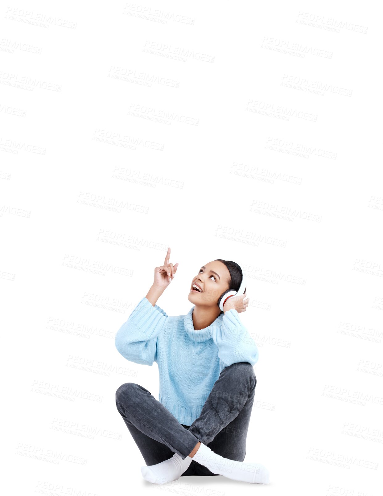 Buy stock photo Music headphones, pointing up and happy woman relax, listening to song and gesture at student podcast news. Radio promotion, audio sound or person sit on floor isolated on transparent, png background