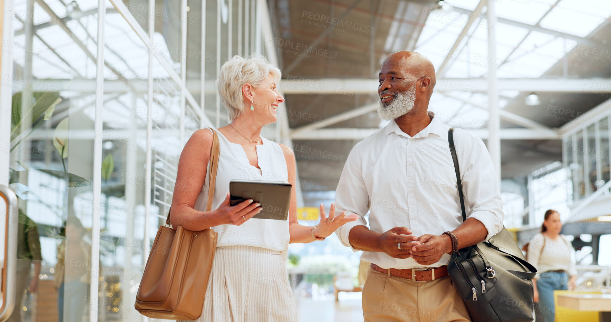 Buy stock photo Advice, planning and business people networking with a tablet, consulting strategy and proposal communication. Conversation, project and elderly employees walking in office with tech for connection