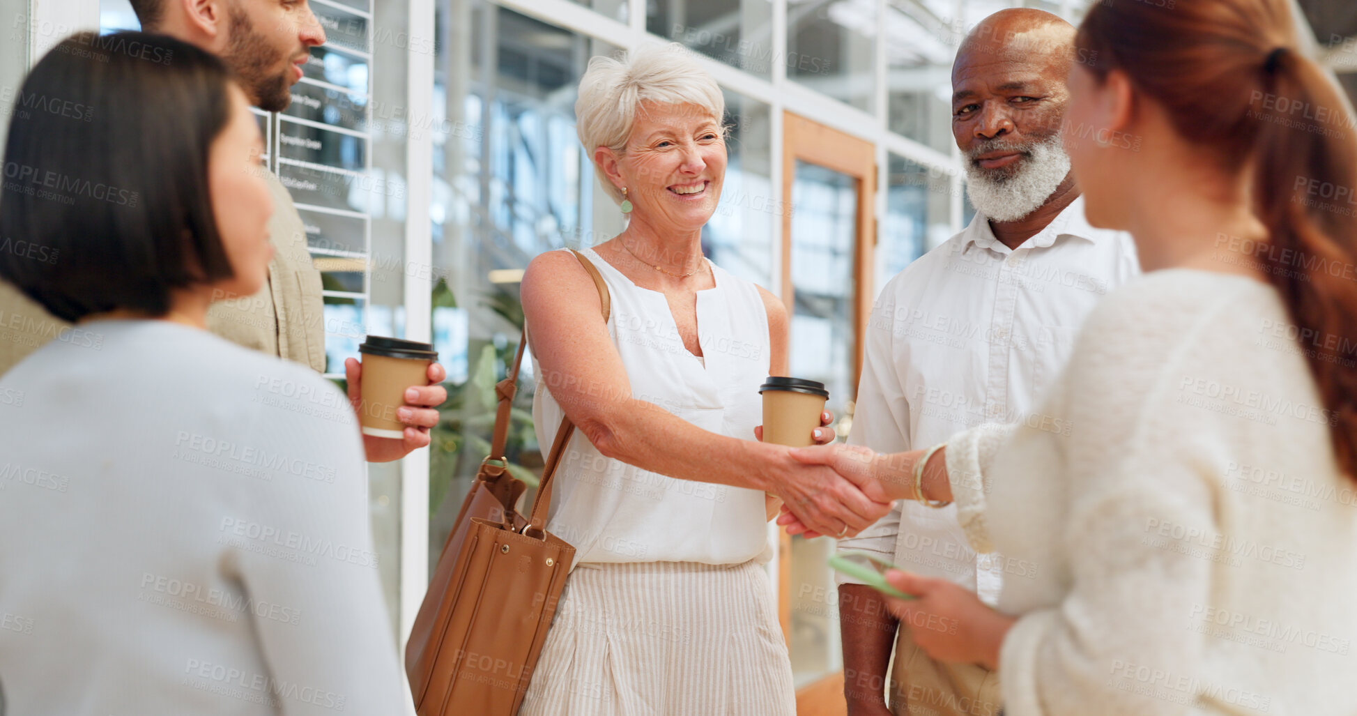 Buy stock photo Business people, manager handshake and meeting internship employees in marketing office, advertising company or branding startup. Smile, happy or mature leadership shaking hands in team work welcome