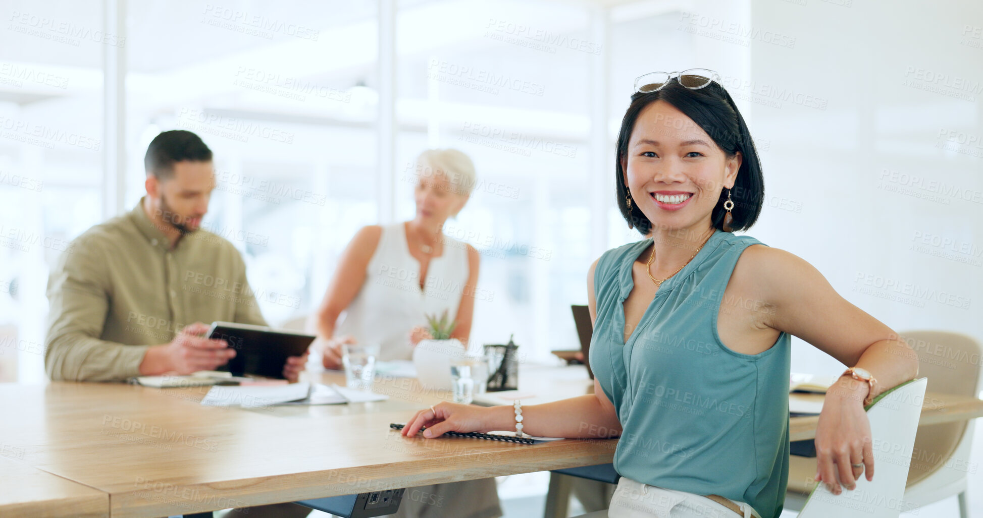 Buy stock photo Portrait, happy or woman in a meeting planning a branding, advertising or marketing strategy with business people. Partnership, face or Japanese worker smiles with pride after a successful project