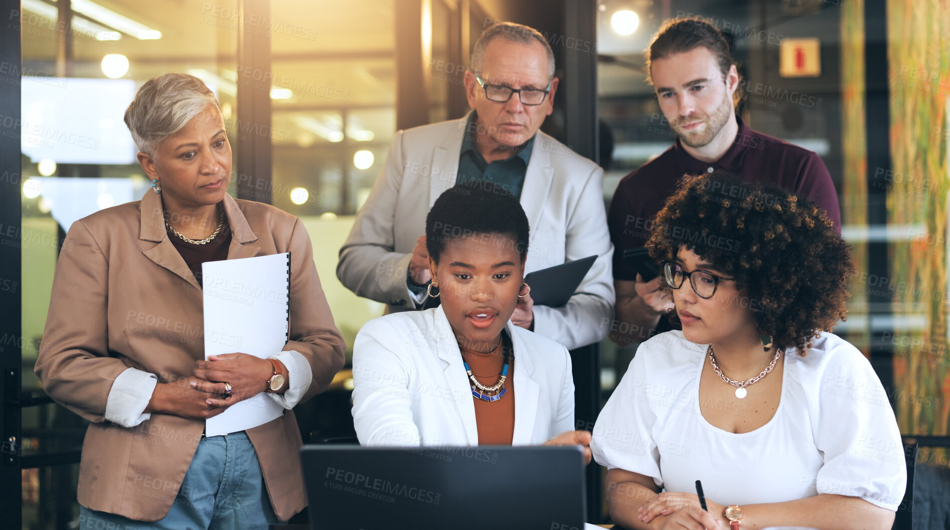 Buy stock photo Boss, black woman and strategy with team in office for planning, meeting or presentation with laptop. Diverse group, together and serious for new project, management or brainstorming by collaboration