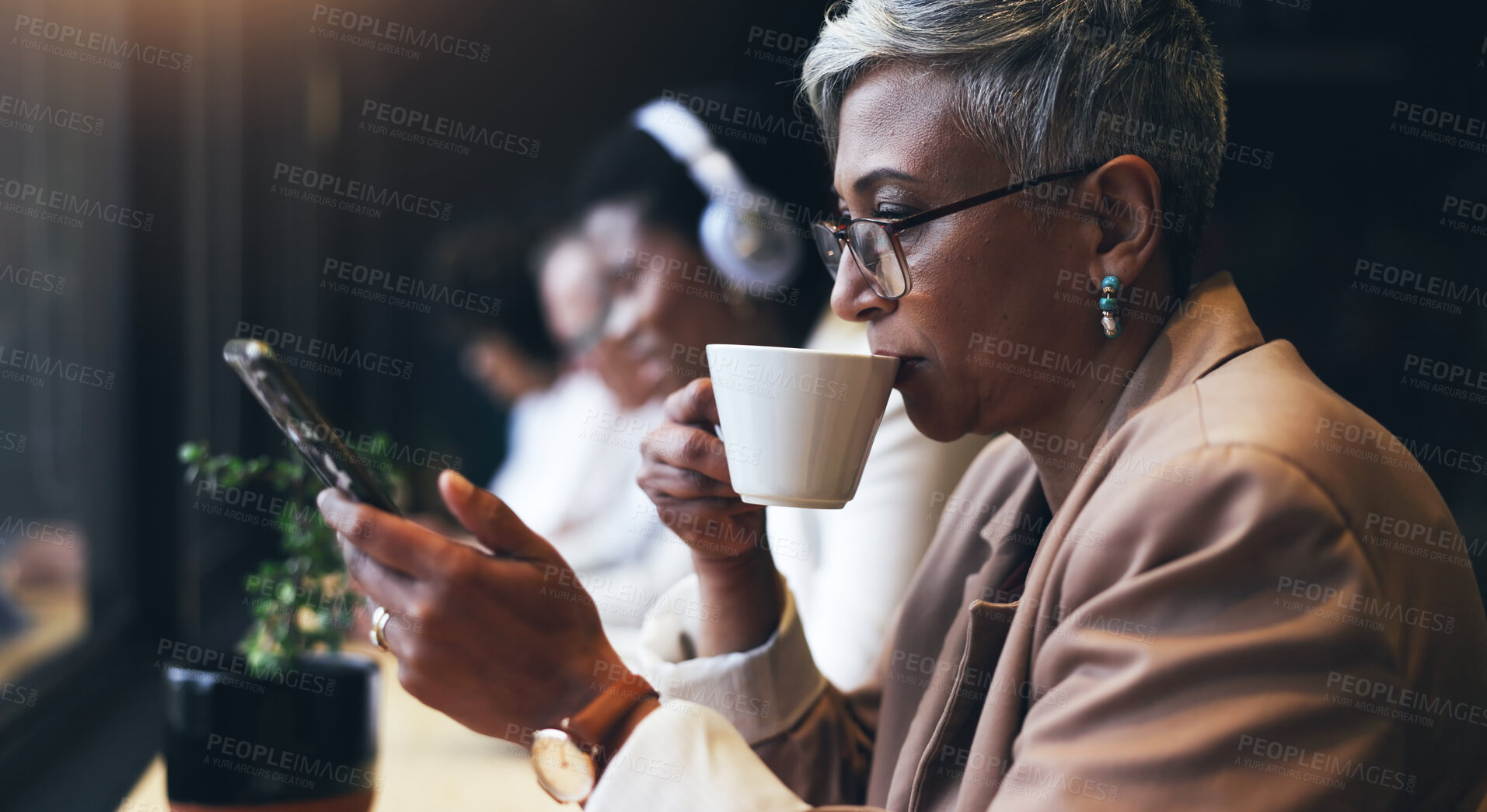 Buy stock photo Face, phone and business woman drinking coffee in a cafe while reading a text message for communication. Mobile, networking and caffeine with a mature employee in a restaurant for a break from work