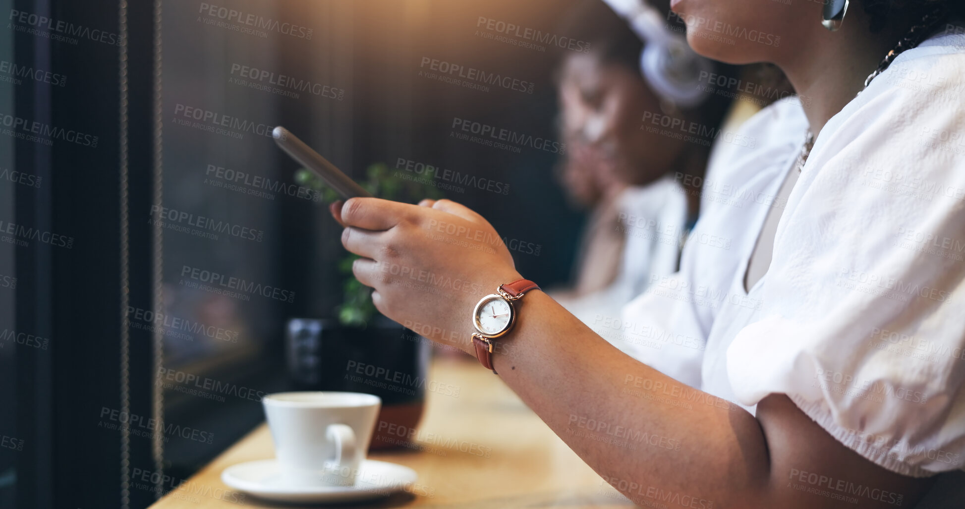 Buy stock photo Hands, phone and coffee shop or cafe in communication, social media and networking or internet search by window. Woman typing, chat or contact information on mobile at restaurant for customer reviews