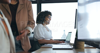 Call center, headset and a woman talking with a smile in an office for crm and support. Female consultant or agent at computer for customer service, telemarketing and contact us or help desk advice
