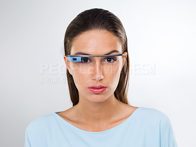 Buy stock photo Portrait, woman and futuristic glasses for augmented reality, metaverse or serious in studio isolated on white background. Face, cyber eyewear and smart tech, virtual or digital spectacles for vision