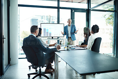 Buy stock photo Manager, leader and boss talking to his team or group of colleagues in a presentation, seminar or workshop in a boardroom meeting. Discussing strategy, the company mission and vision for the future