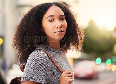 Buy stock photo Young, serious and portrait of a woman in the city waiting for a cab, lift or public transport. Beautiful, confident and headshot of a female person from Mexico walking in an urban town street.