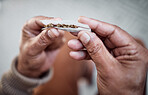 Marijuana, cannabis or hands rolling weed joint for calm peace to relax or help reduce pain, stress or anxiety. Smoker, smoking or closeup of person showing a blunt for mental health benefits on 420