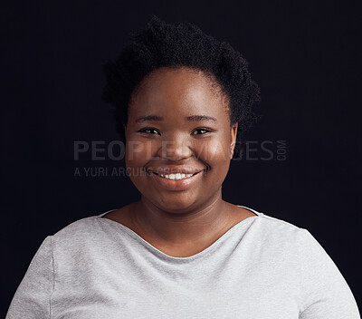 Buy stock photo Face, smile and black woman, plus size and studio isolated on a dark background. Happy, portrait and African person with positive mindset for fashion, casual tshirt and stylish clothes from Nigeria