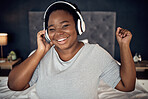 Smile, music headphones and black woman in portrait, dance and happy in home bedroom. Radio, listening and face of plus size African person hearing audio, podcast and streaming sound online at night