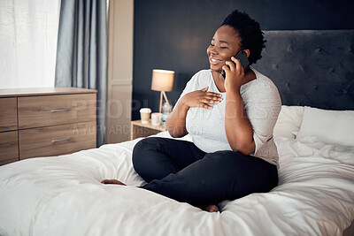 Buy stock photo Phone call, happy and black woman on bed in home, talking and communication in the morning. Smartphone, conversation and African plus size person smile for discussion, chat and speaking in bedroom