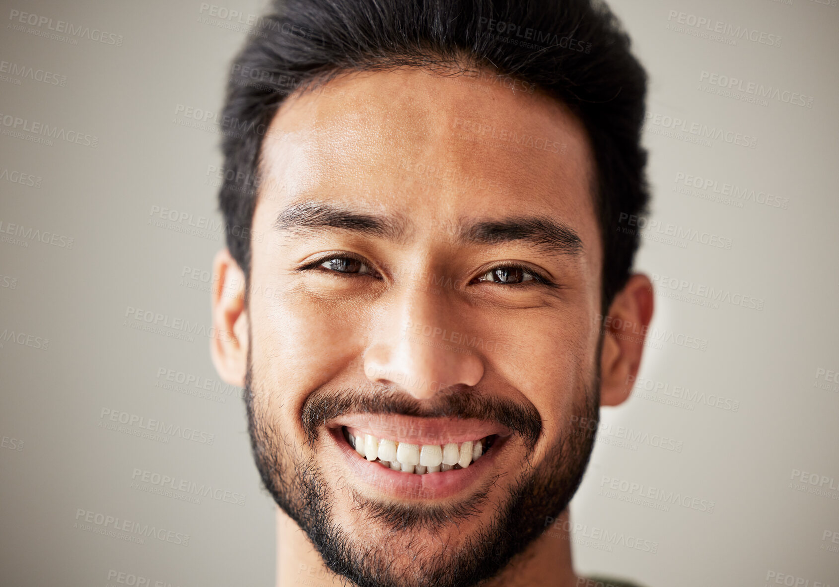 Buy stock photo Face, portrait and smile of happy asian man in studio with positive mindset, wellness and awareness. Face of a young male model isolated on a grey background with happiness and confident headshot