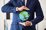 Hands, world and travel insurance with a man in his office to offer protection or cover during a flight. Plane, service or vacation and a business person in a suit with a globe icon for trip safety
