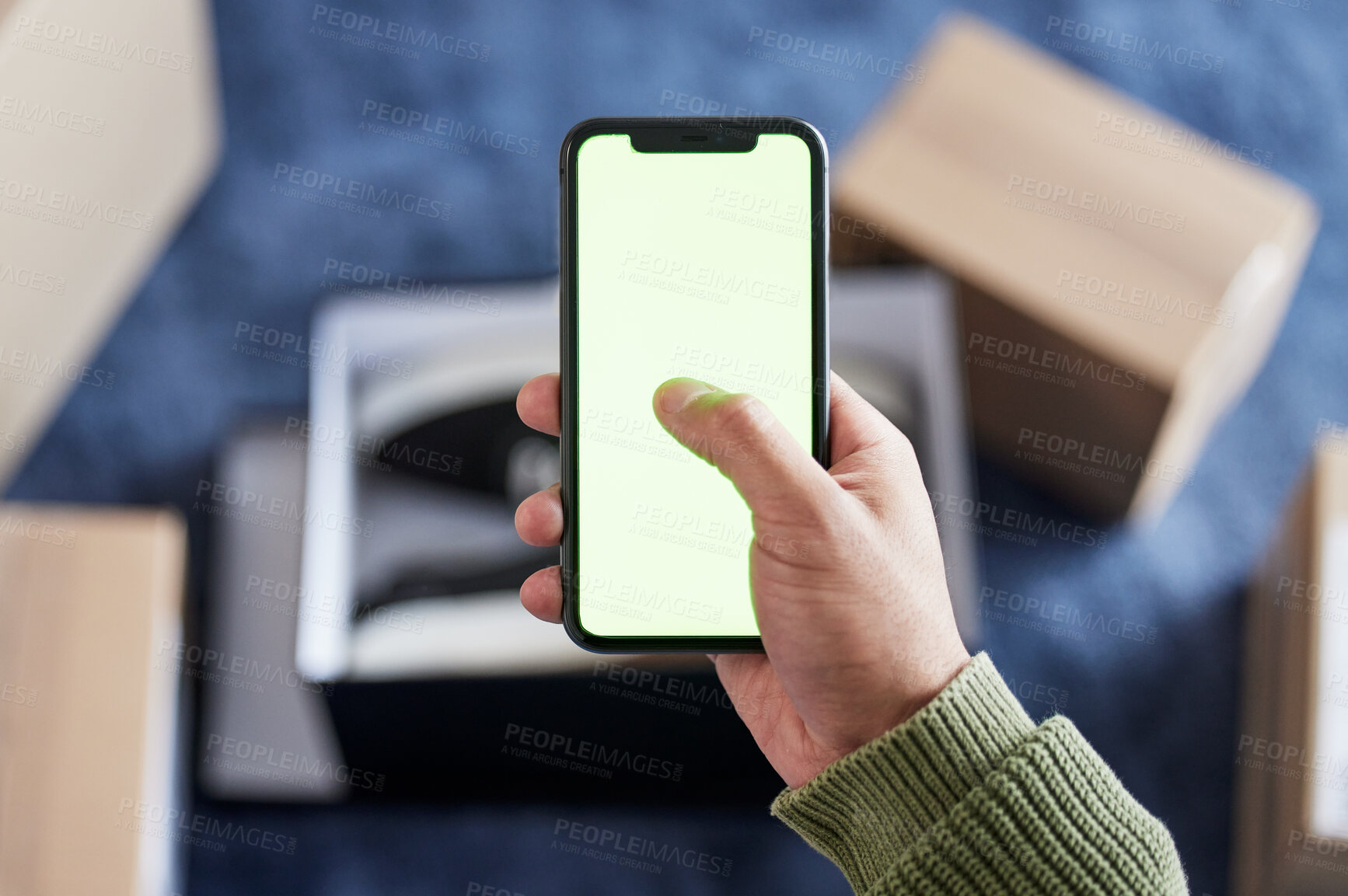 Buy stock photo Phone green screen, boxes and person hands online shopping, scroll ecommerce site or check omnichannel website. Courier service, mail shipping or home customer with cellphone, delivery app or package