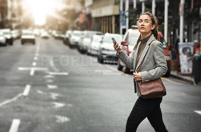 Buy stock photo Smartphone, business woman and cross street for journey, sunset commute and social media on internet. Mobile, consultant and person walking in city on phone for networking, cbd travel and lens flare
