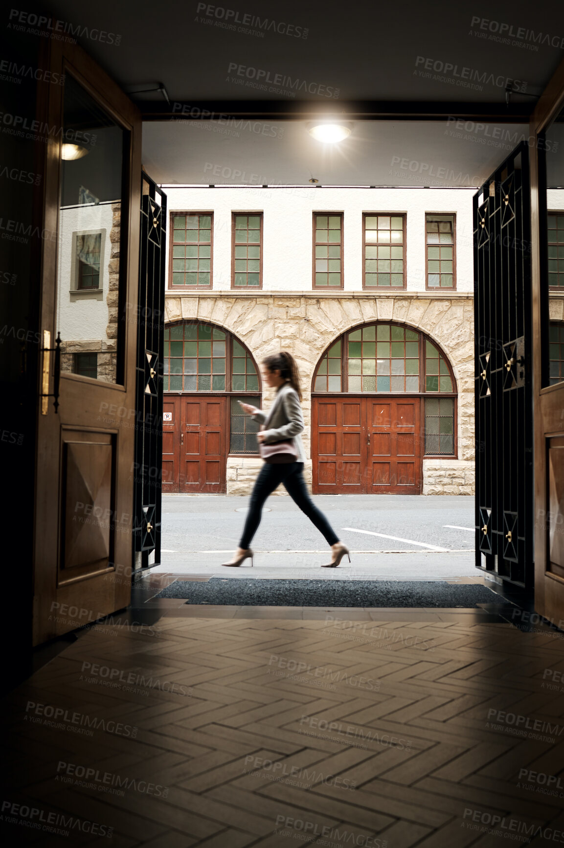 Buy stock photo Phone, door and a woman tourist walking in the city on an overseas trip to search for directions to a location. Building, architecture and travel with a person in an urban town for a vacation abroad